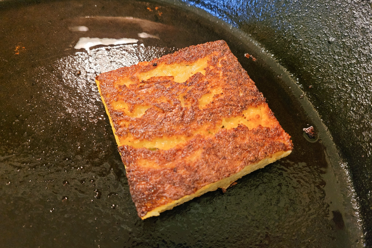 Charred Ramps with Crispy Polenta, Chorizo, and Hot Honey - Ian Benites
